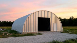 Quonset hut steel building in Alberta at sunset