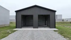 Black metal 2-car garage with open bays and gravel driveway