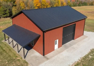 Aerial view of a 30x40 heavy-duty steel storage building with a porch.