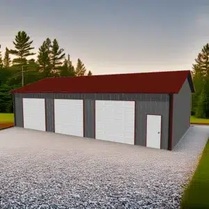 30x50 pre-engineered steel garage kit in a wooded setting at sunset.