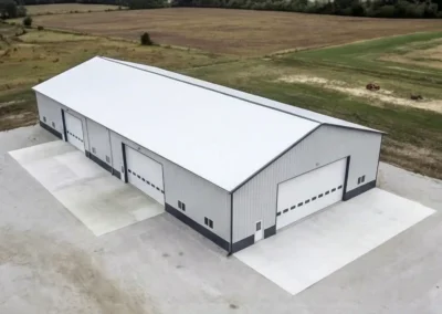 Aerial view of a 50x100 steel manufacturing facility in a rural area.