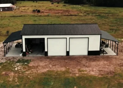 Aerial view of a custom-built metal garage carport in a rural Barrie setting