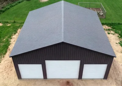 Aerial view of a modern steel farm equipment storage facility.